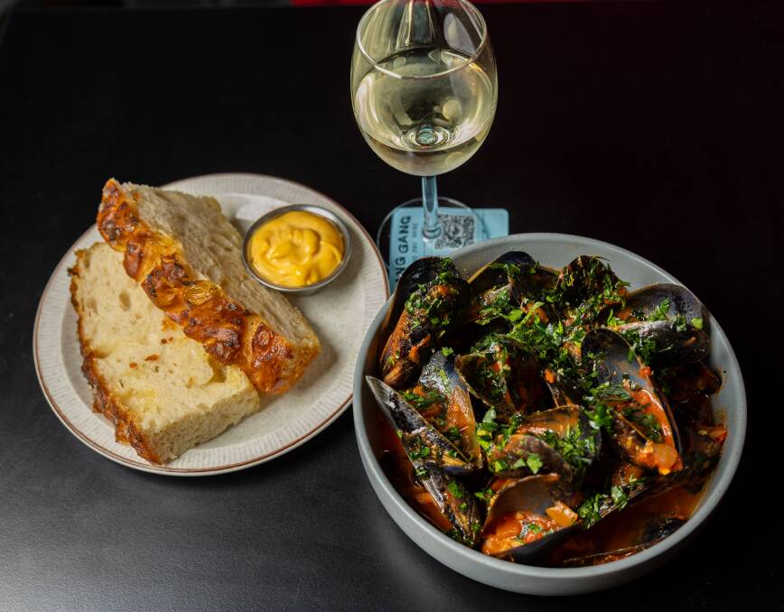 Jervis Bay mussels, tomato and chilli sauce, aioli and focaccia. Picture by Gary Ramage