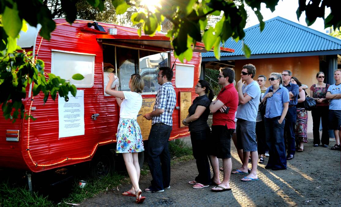 In the early days fans would line up for two hours for a burger at Brodburger at Bowen Park. Picture: Marina Neil