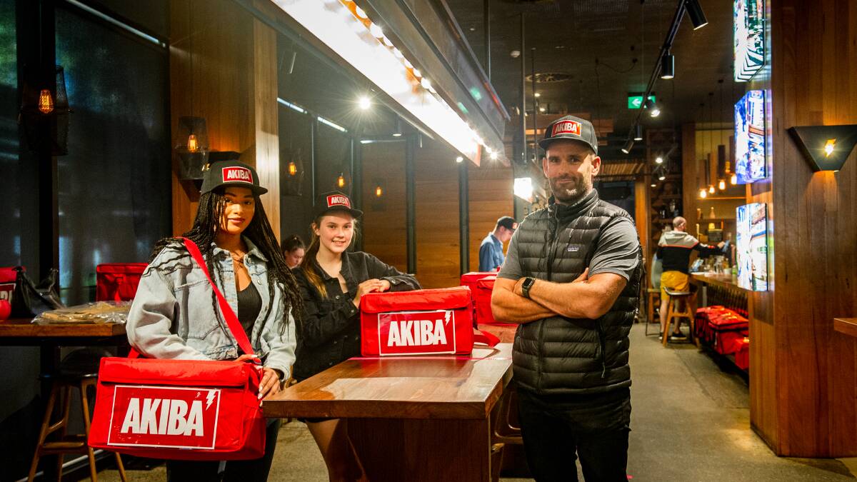 Akiba owner Michael Harrington, right, with delivery drivers Ruby Smith and Ella Hrstic. Picture: Elesa Kurtz
