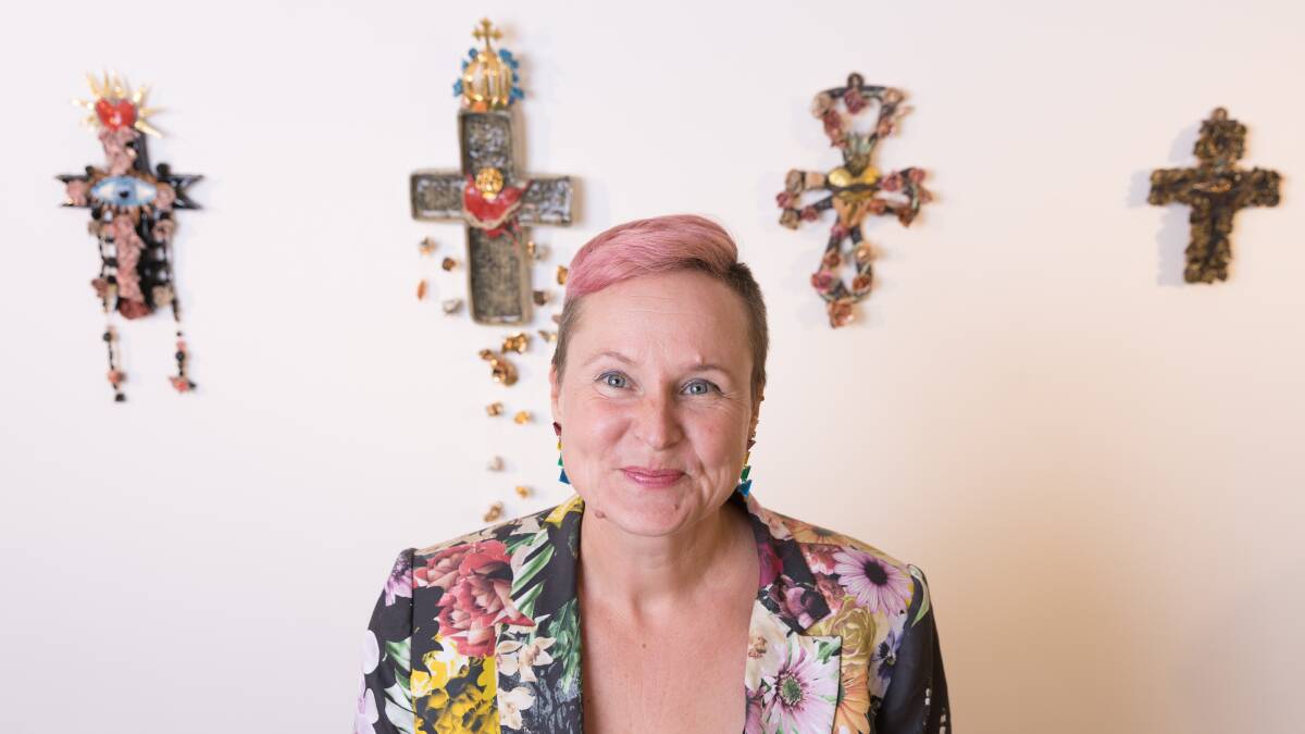 Bella Insch's collection of works include a series of porcelain crucifixes. Picture by Sitthixay Ditthavong