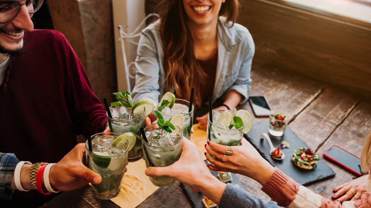 There's no need to stop catching up with friends during Dry July, just change up the drinks. Picture Shutterstock