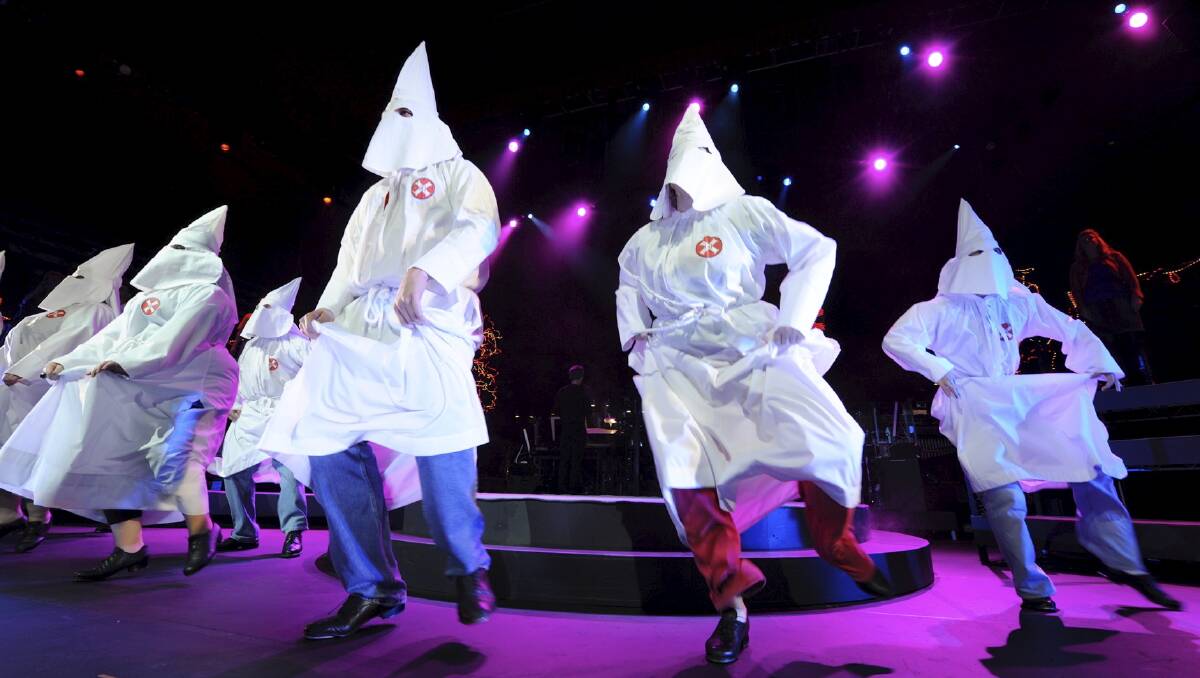 Ku Klux Klan members dance in Jerry Springer: the Opera. Picture: Supplied