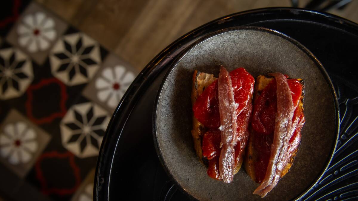 Ortiz anchovy on toast with confit tomato at Temporada. Picture by Karleen Minney