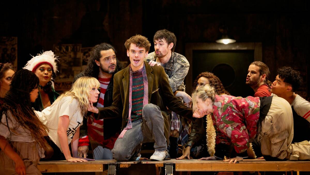 Noah Mullins, centre, and the cast of Rent. 