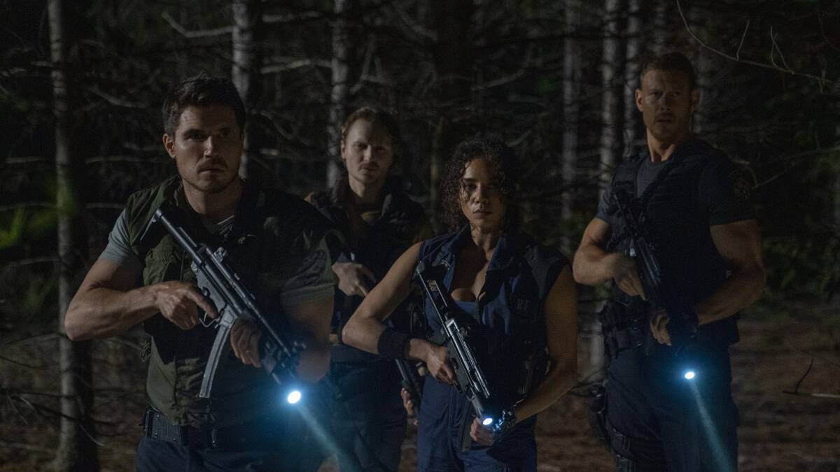 Robbie Amell, Chad Rook, Hannah John Kamen, and Tom Hopper in Resident Evil: Welcome to Raccoon City. Picture: Shane Mahood