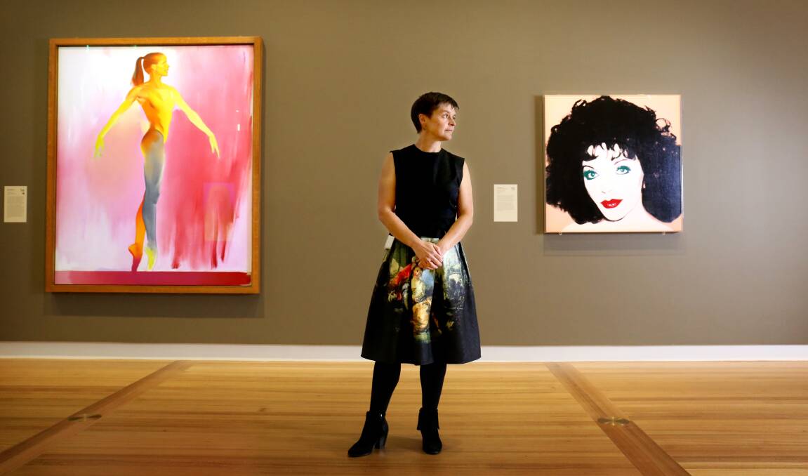 National Portrait Gallery curator Joanna Gilmour at the new Shakespeare to Winehouse exhibition with portraits of Darcey Bussell by Allen Jones, left, and Joan Collins by Andy Warhol, right. Picture: James Croucher