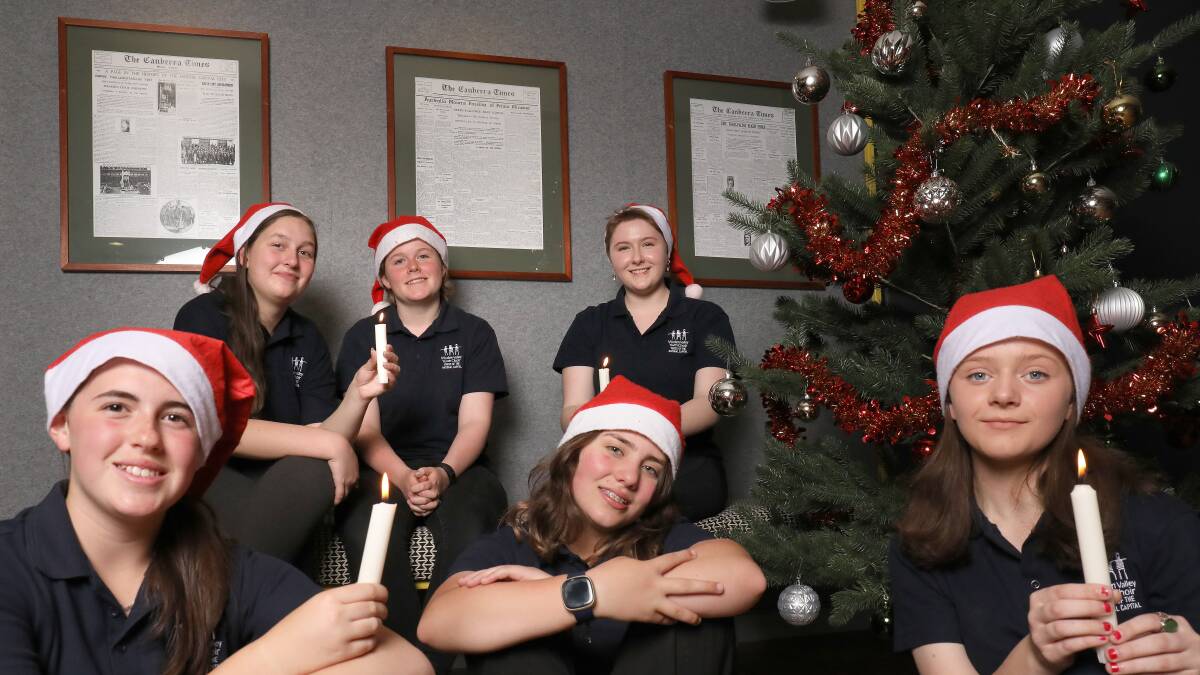Woden Valley Youth Choir members at the launch of The Canberra Times Carols by Candlelight. Picture by James Croucher