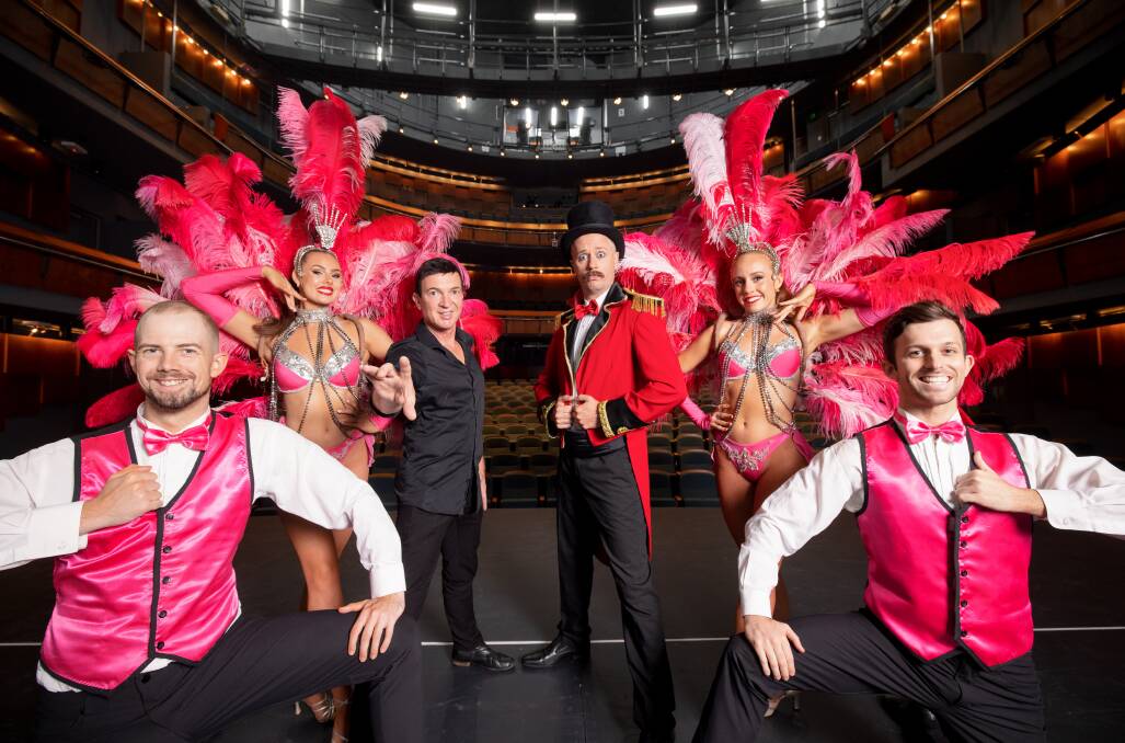 Producer and illusionist Michael Boyd, centre left in black, is bringing the Circus of Illusion to the Canberra Theatre this Sunday. Picture: Sitthixay Ditthavong