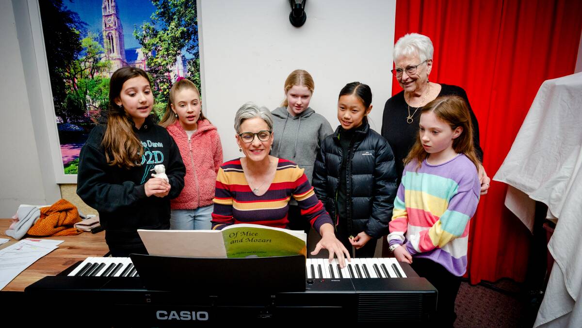 Lizzy Ursich, 11, of Chapman, Jessica Hamood, 10, of Queanbeyan, Abbey Heather, 12, of Dickson, Angelika Bui, 12, of Watson and Emily Weiss, 9, of Narrabundah, rehearsing for the next show by Pied Piper Productions with music director, Emma Zen and artistic director, Nina Stevenson. Picture: Elesa Kurtz
