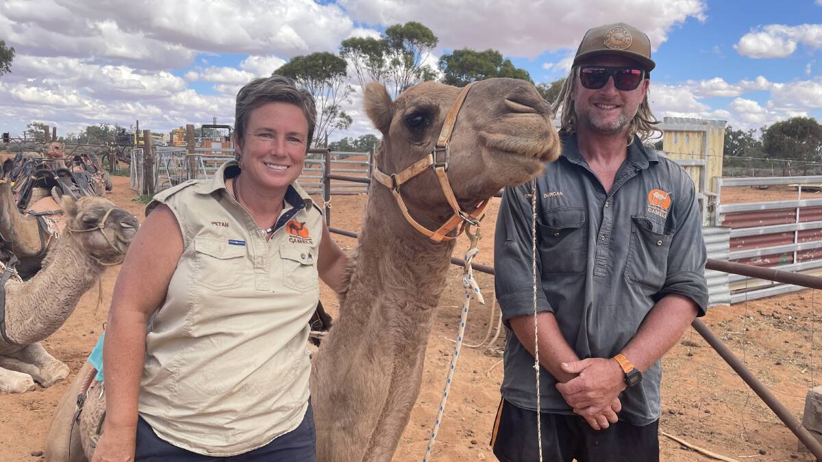 Silverton Outback Camels owners Petah Devine and Duncan Pickering, with Harold the camel. Picture: Sarah Falson
