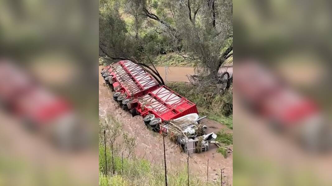 A cattle truck rolled over after driving across a flooded causeway in Werris Creek. Picture by Liverpool Plains Shire Council