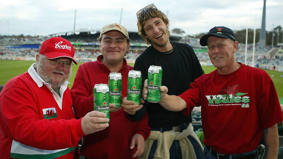 Welsh supporters in the crowd prior to the Rugby World Cup Pool D match between Italy and Wales at Canberra Stadium on October 25, 2003. Picture: Getty Images
