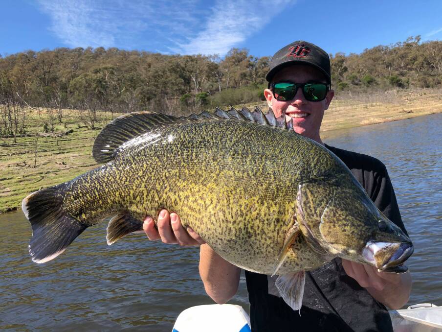 Liam Rowley with an obese Murray cod lured from Googong on a Jackal.