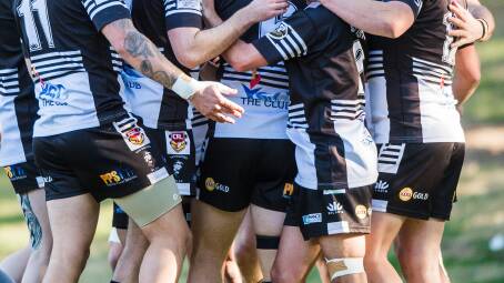 Match officials as well as officials from Yass Magpies moved swiftly to remove a fan from the ground after homophobic abuse directed towards a touch judge. Picture: Sitthixay Ditthavong