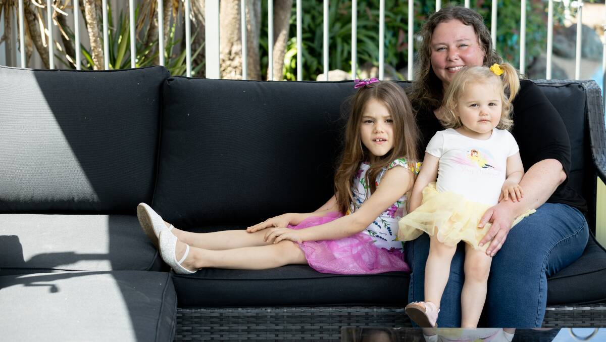 Rachel Corbett with daughters Maddi, 7, and Savannah, 2. Picture: Sitthixay Ditthavong