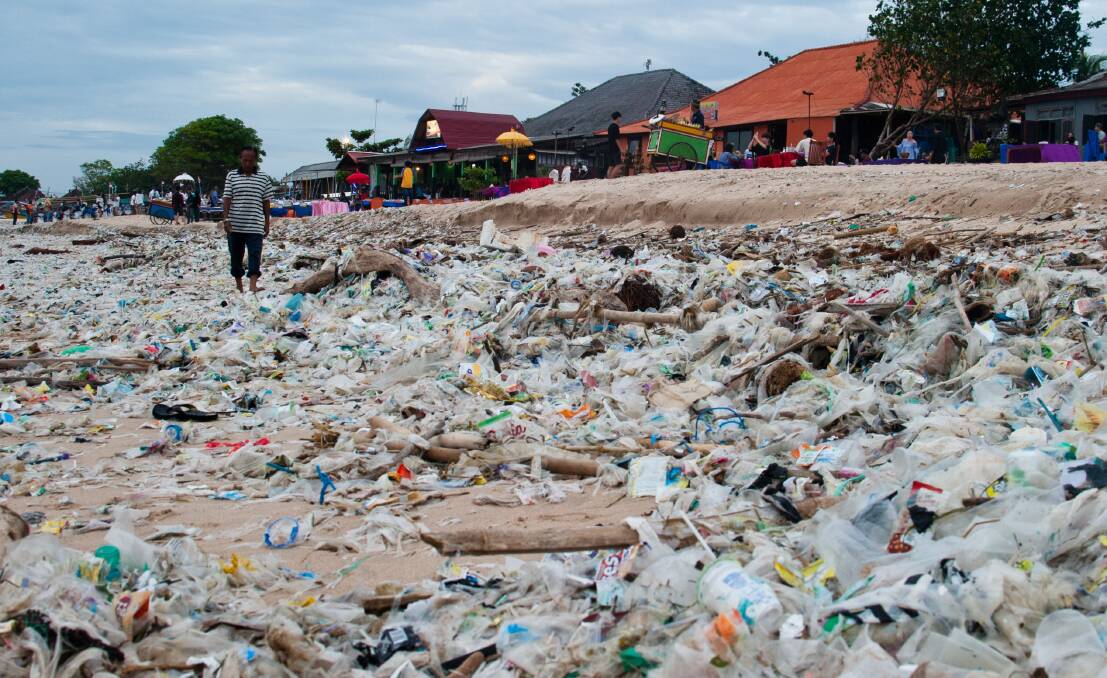 A beachfront in Bali covered with rubbish. Picture: Getty Images