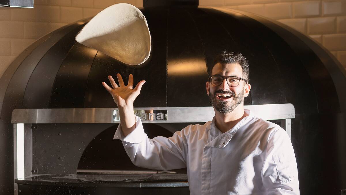Chef Francesco Balestreiri with the new pizza oven at Joe's Bar. Picture: Adam McGrath