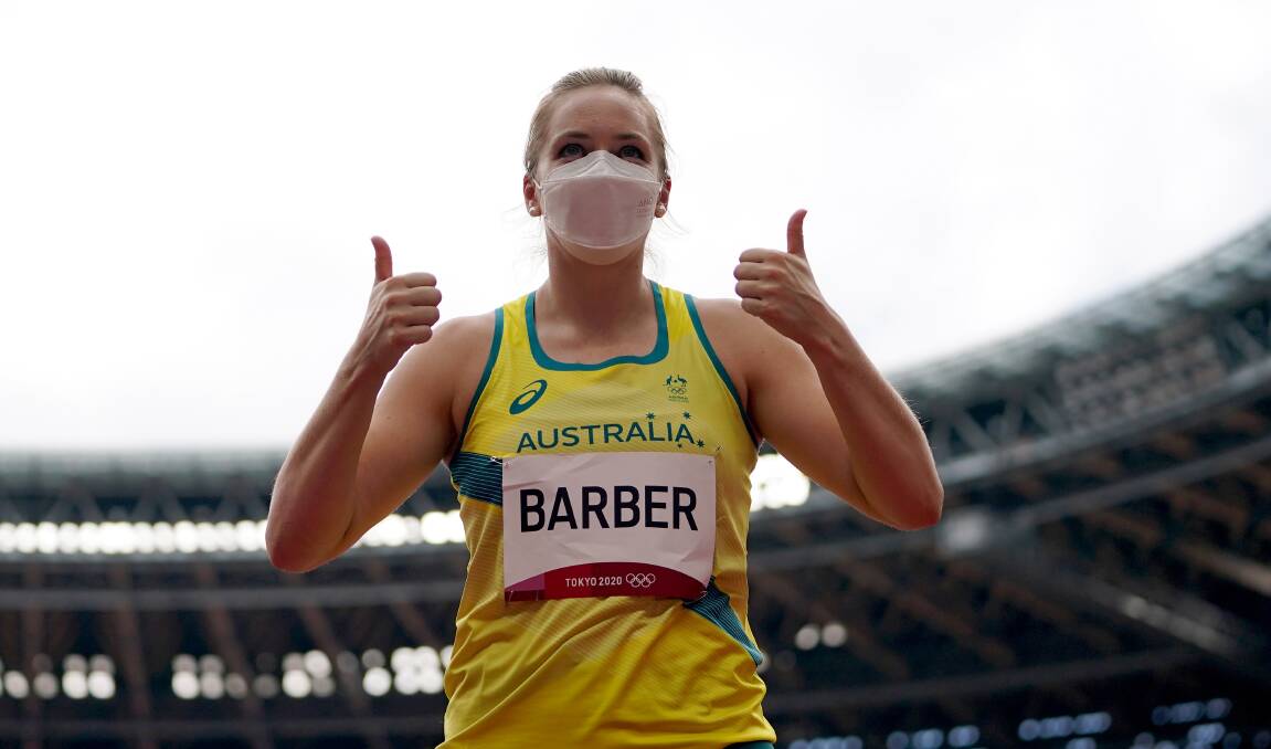 Kelsey-Lee Barber was all smiles (albeit masked) on Tuesday after qualifying for the women's javelin final. Picture: AAP