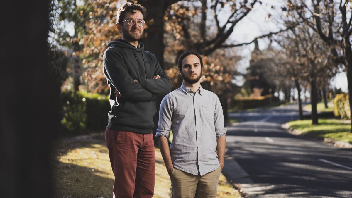 ANU School of Culture, History and Language researcher Dr Simon Connor and research assistant Jonah Lafferty are compiling data on which streets in Canberra have the most allergenic trees. Picture: Dion Georgopoulos