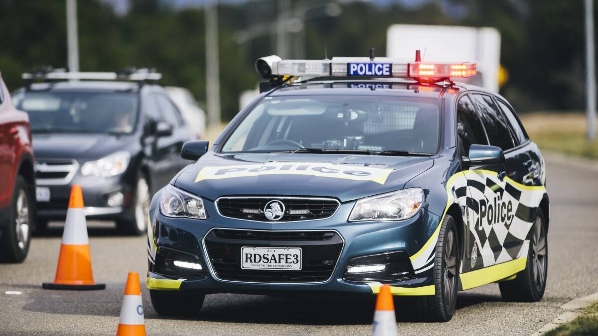 One dead, three hospitalised after two-car crash in Canberra's north