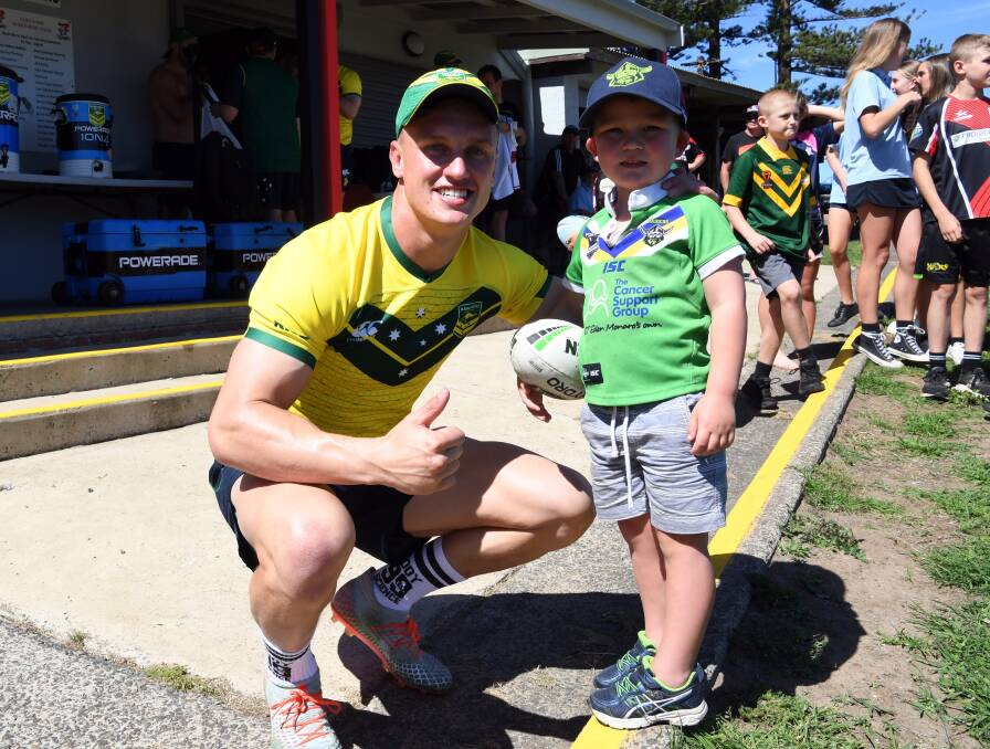 Jack Wighton meets a young Raiders fan in Kiama on Monday. Picture: NRL Imagery