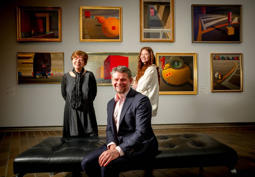 National Gallery director Nick Mitzevich (centre) with exhibition co-curators Deborah Hart and Rebecca Edwards at the opening of the Jeffrey Smart exhibition. Picture: Elesa Kurtz