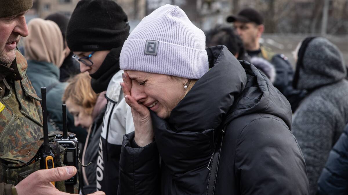 A woman cries after not being able to board an evacuation train that departed carrying women and children that fled fighting in Bucha and Irpin from Irpin City to Kyiv that was scheduled after heavy fighting. Picture: Getty Images