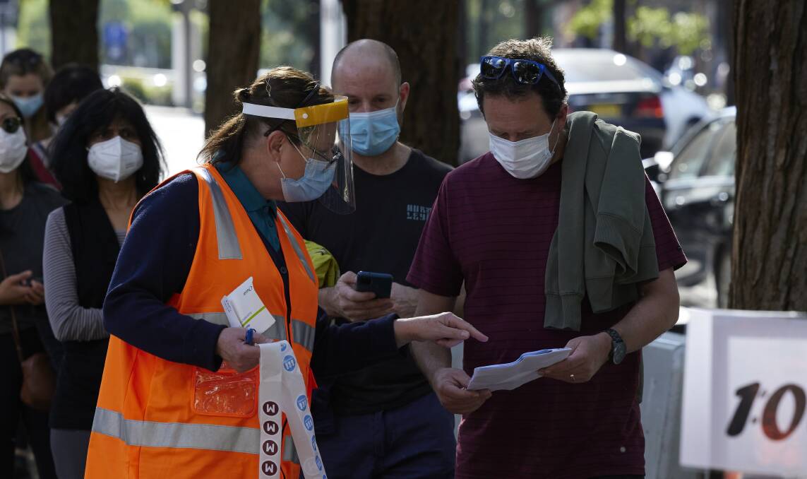 Sydneysiders line up to receive a COVID-19 vaccination this week. Picture: Getty Images