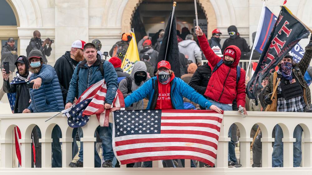 Donald Trump loyalists storm the US Capitol Building on January 6, 2020. Picture: Shutterstock