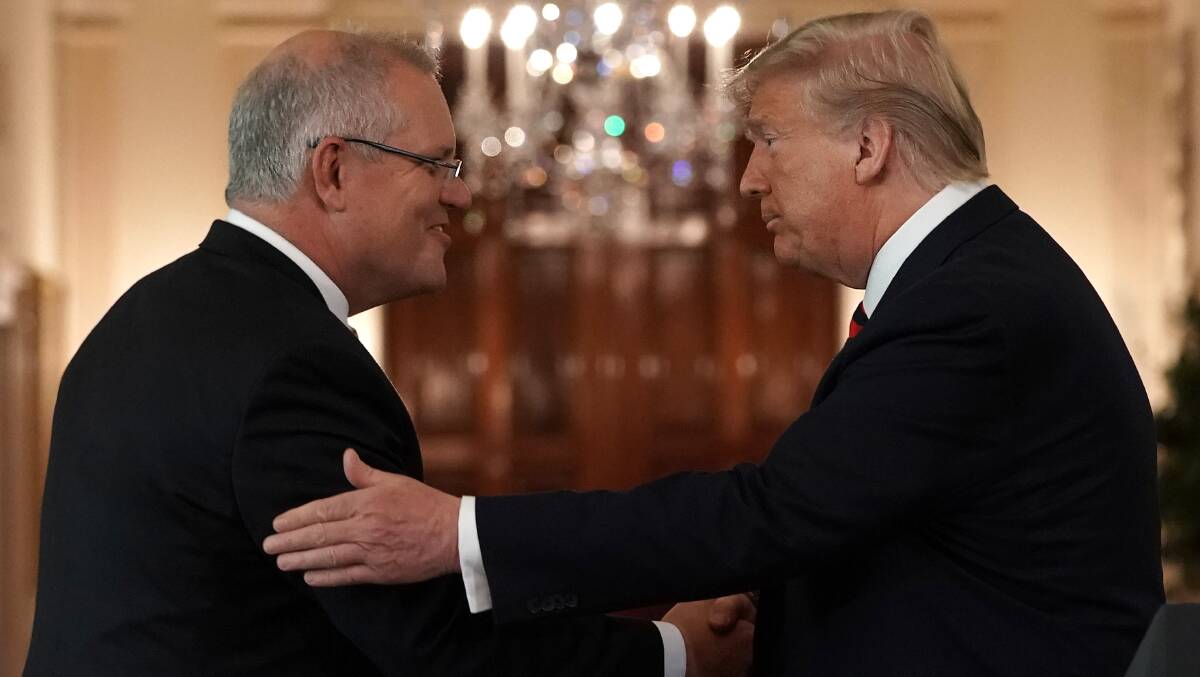Scott Morrison is dog-whistling from Donald Trump's Republican playbook with his completely unnecessary voter ID bill. Picture: Getty Images 