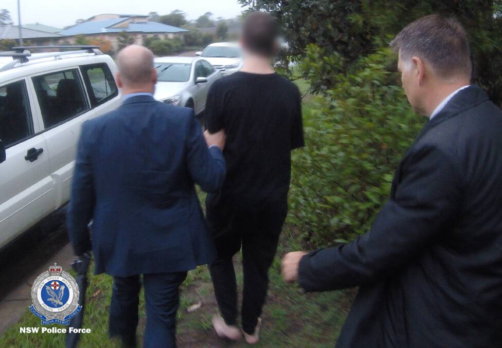 Police arresting a teenager over the death of Canberra man Peter Keeley. Picture: NSW Police
