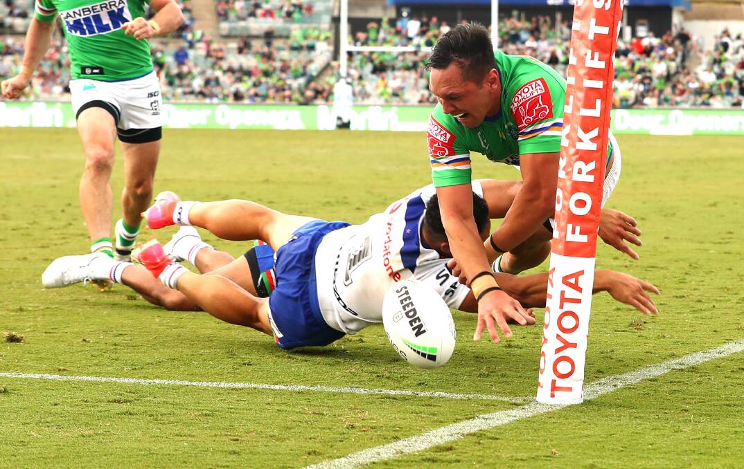 Raiders winger Jordan Rapana is denied what would have been a match-winning try at the death by an incredible Roger Tuivasa-Sheck try-saver. Picture: Keegan Carroll