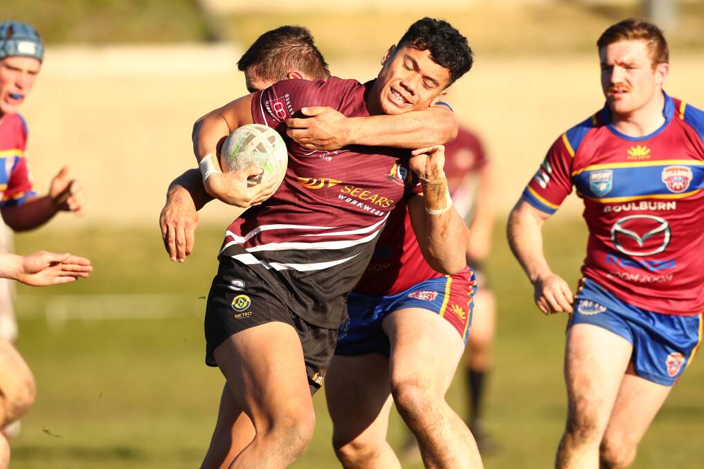 Roos' David Fale tries to bust through the Goulburn defence. Picture: Keegan Carroll