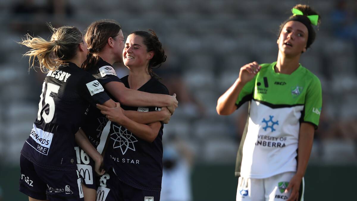 Rachel Lowe celebrates Sydney FC's sixth goal with teammates. Picture: Getty