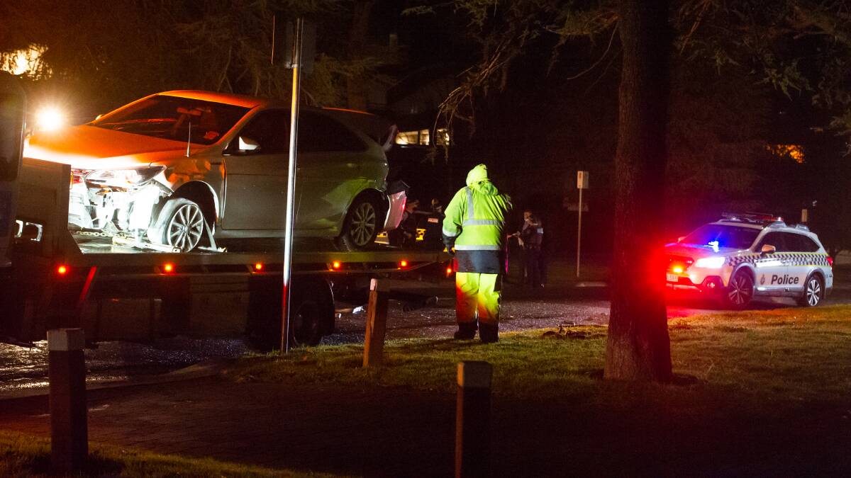 The stolen Jeep used in the incident is towed away afterwards. Picture: Elesa Kurtz