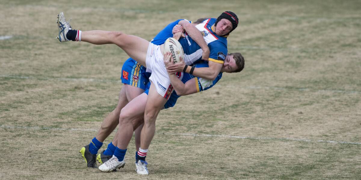 The Warriors' Brandon Withers tackles the Bushrangers' Connor Massen in the Canberra Raiders Cup last year. Picture: Sitthixay Ditthavong