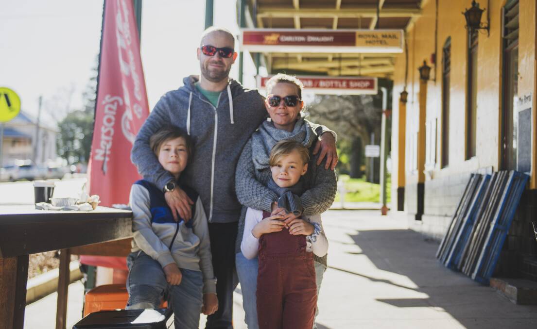 Peter, Hannah, George, 10, and Maisy Milne-Freyne, 7, stop off at Braidwood for lunch before they head to the South Coast on Thursday, Picture: Dion Georgopoulos