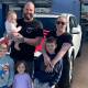 William Johns, 7, with his stepdad Scott Phillips, mum Alisha Konig and siblings Christopher, 9, Charlie, 4, and Addeline, 11 months, with the new car. Picture: Supplied