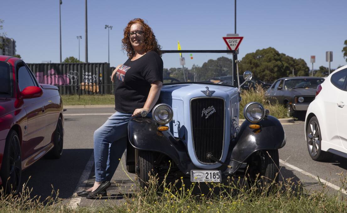 Heidi Pritchard, of Fraser, with her 1935 Austin 7 Roadster before the start of the Clayton's Summernats Classic and Muscle Car Cruise down Northbourne Avenue. Picture: Keegan Carroll