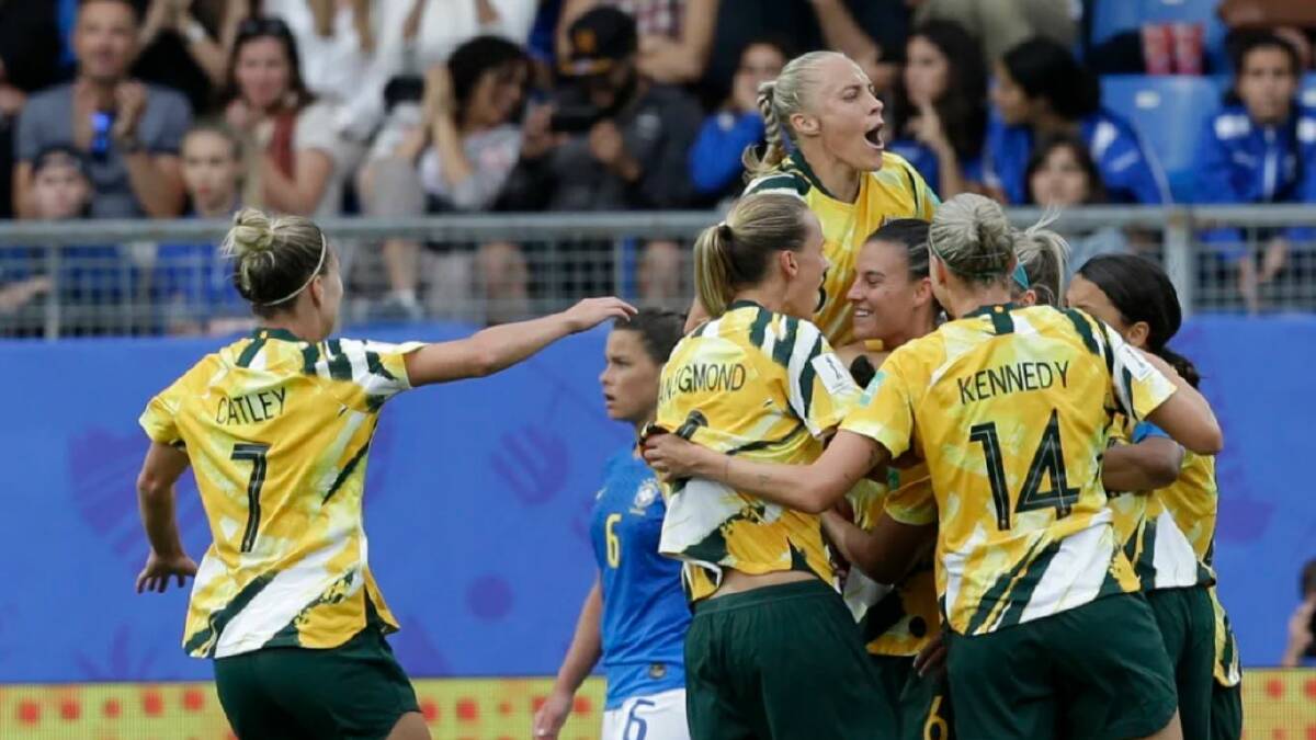 Australia's players celebrate after Chloe Logarzo scored their side's second goal. Picture: AP