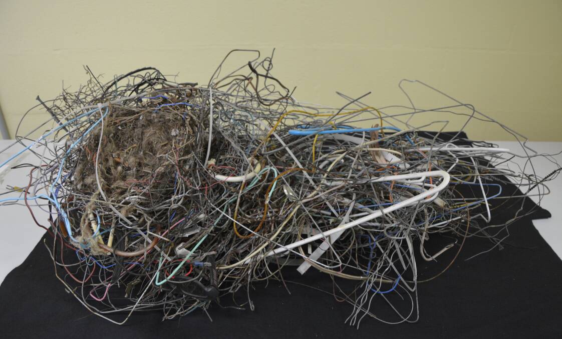 The Red Hill nest woven with coat hangers that is now part of the CSIROs official nest collection. Picture: Tim the Yowie Man 