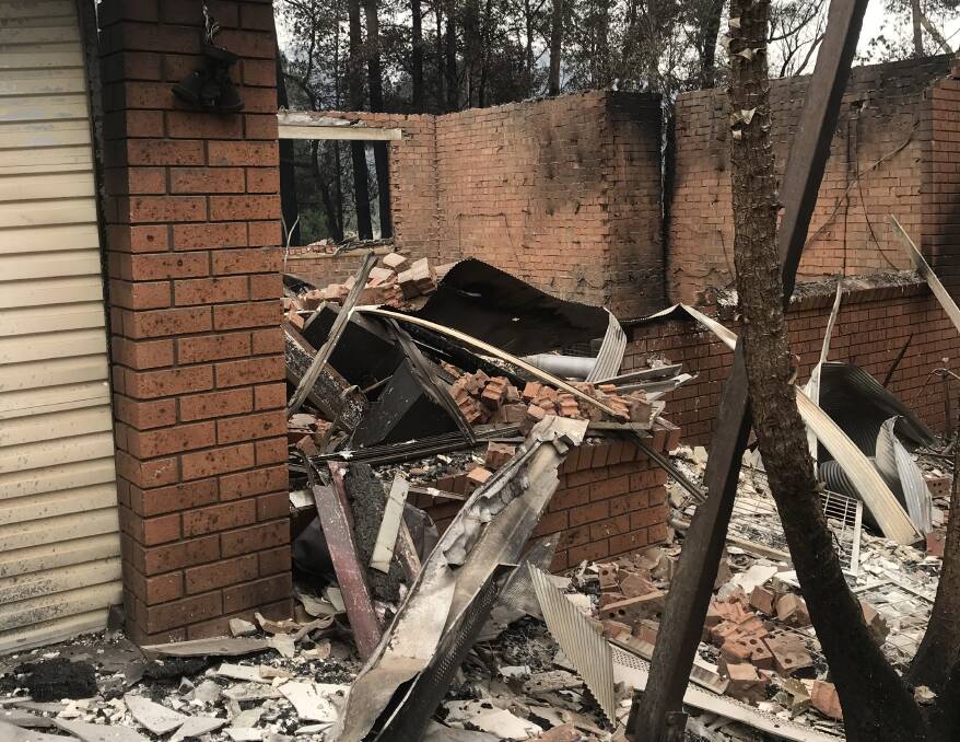 ALL IS LOST: My father and stepmother were out shopping when fire destroyed their house.