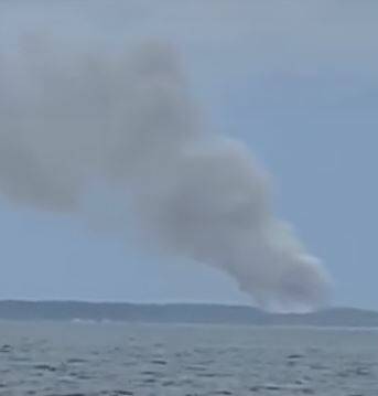 FIRE: The fire in the Booderee National Park at Jervis Bay is throwing up a massive plume of smoke. Image: Scott Sheehan