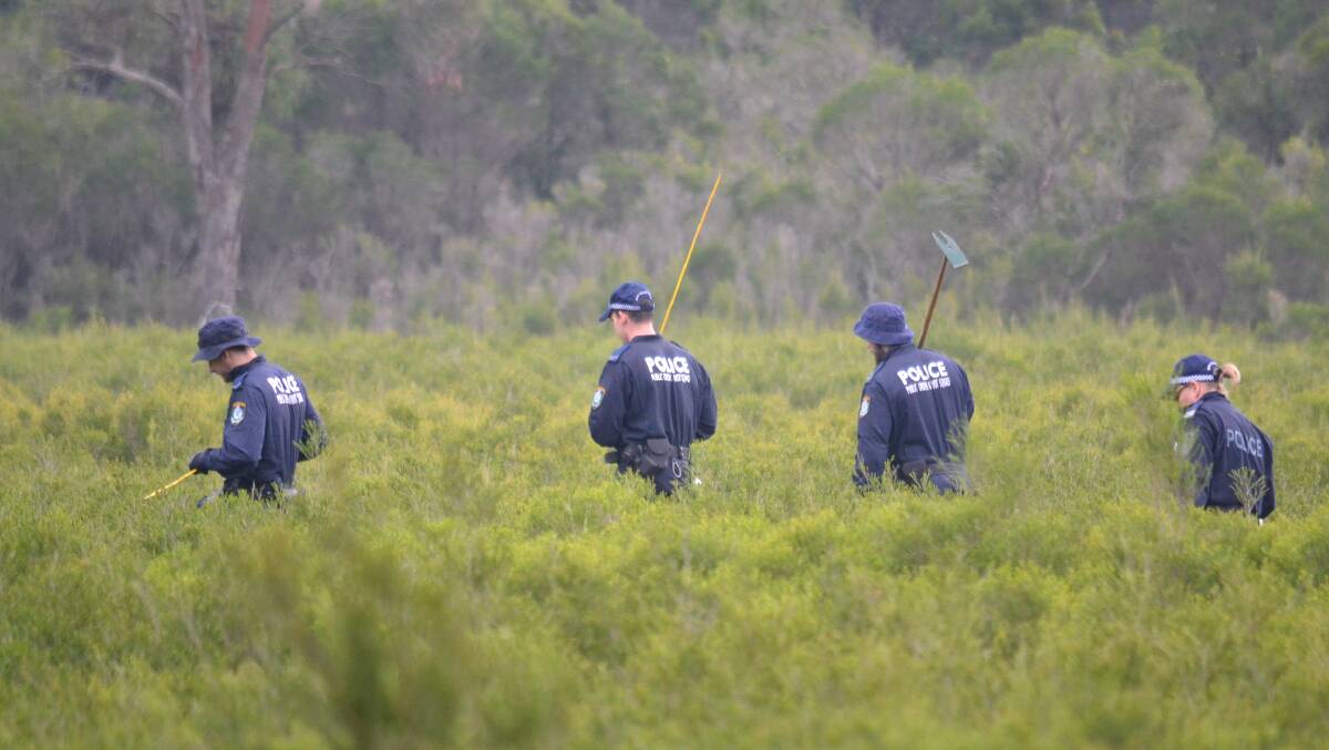Police search bushland off Warra Warra Road at South Nowra as part of the investigation into missing Sydney woman Samah Baker. Photo: Damian McGill