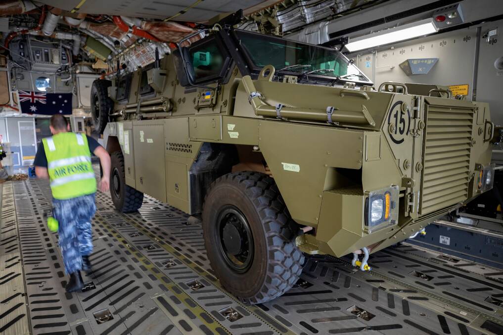 A Bushmaster being loaded onto a plane to be shipped to Europe last year. Picture supplied by the Australian Defence Force/Kate Czerny