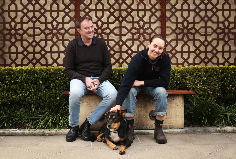 Next gen: Winemaker Andrew Margan with daughter Alessa Margan and Bonneau the dog at their family business, Margan Wines and Restaurant in Broke in the Hunter Valley. Picture: Simone De Peak