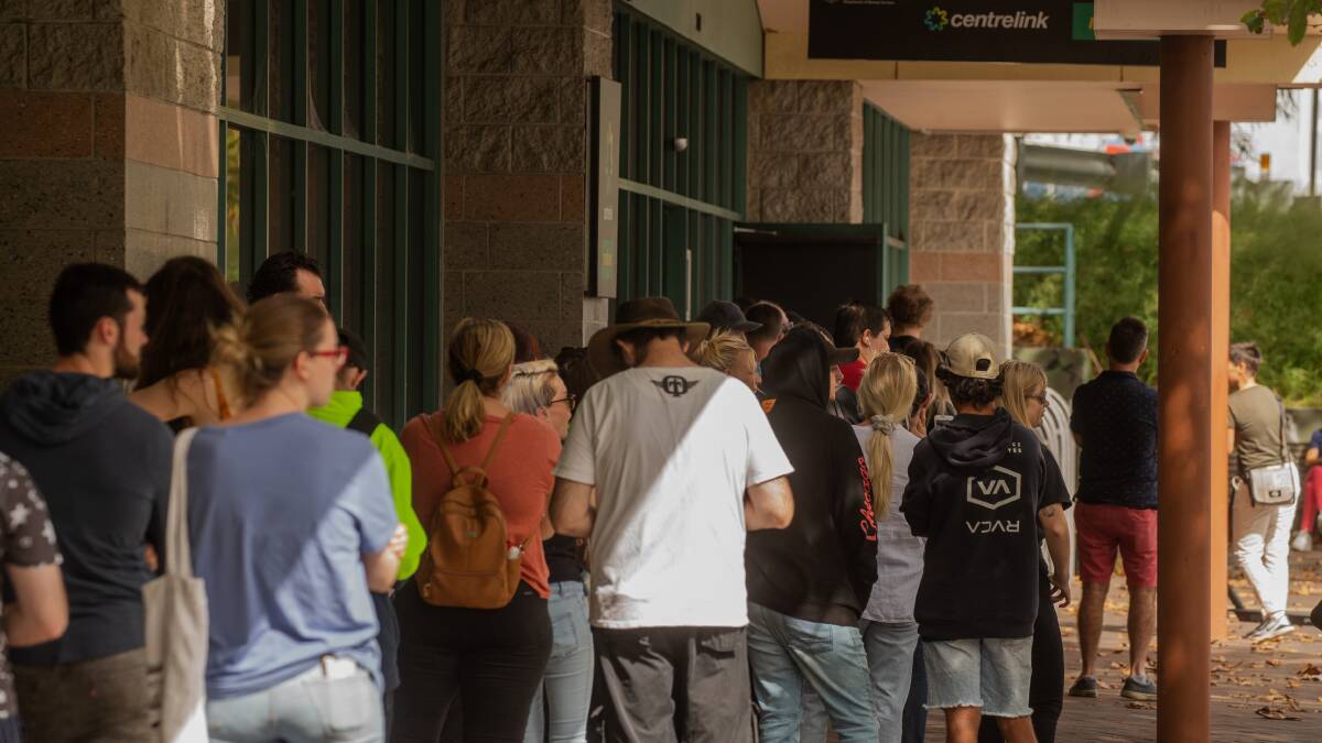 Hundreds suddenly rendered unemployed by the pandemic queue for Centrelink support.