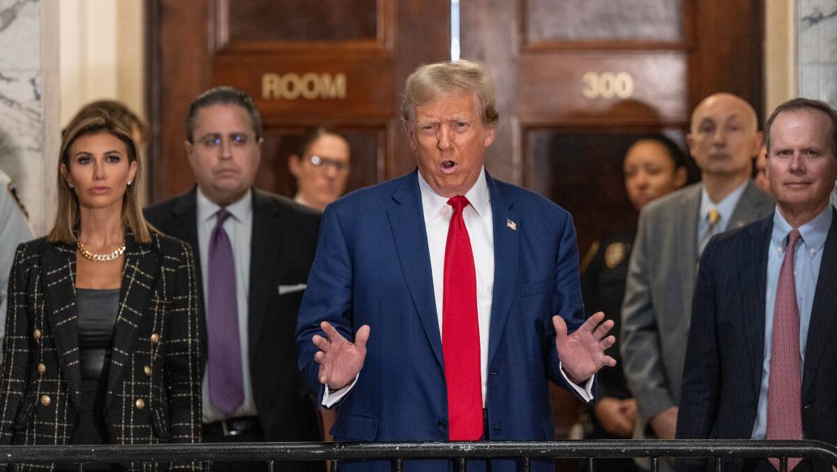Former president Donald Trump speaks to the press before closing arguments at his civil fraud trial at State Supreme Court in New York on January 11, 2024. Picture Shutterstock