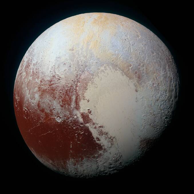 Enhanced colour global view of Pluto, taken when NASAs New Horizons spacecraft was 450,000 kilometres away. Picture: NASA/JHUAPL/SwRI