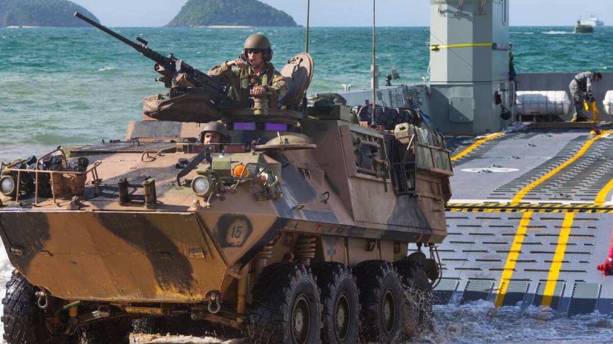 An Australian Army light armoured vehicle disembarks at Cowley Beach. Picture: Defence